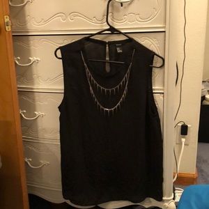 Cut off t-shirt, the necklace is attached.